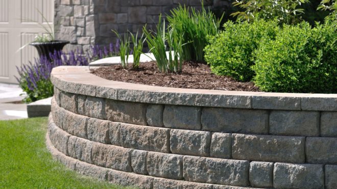 The Benefits of Installing a Stone Retaining Wall